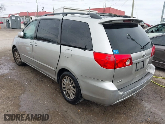2010 Toyota Sienna XLE with VIN 5TDYK4CC0AS306284, listed as a IAAI auction lot 41736735 with 323,886 mi miles and . Bid and sale history available at carsss.com. Image 3.
