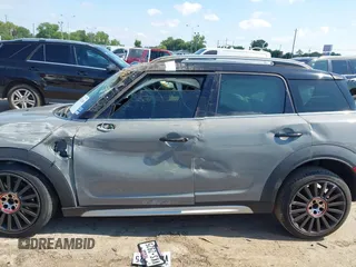 2020 MINI Countryman Cooper S with VIN WMZYW7C05L3M07661, listed as a IAAI auction lot 42242689 with 45,602 mi miles and . Bid and sale history available at DreamBid. Image 14.