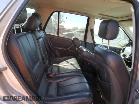 2000 Mercedes-Benz M 320/430/500 with VIN 4JGAB72E5YA173269, listed as a Copart auction lot 71520714 with 239,248 mi miles and Clean title. Bid and sale history available at DreamBid. Image 11.