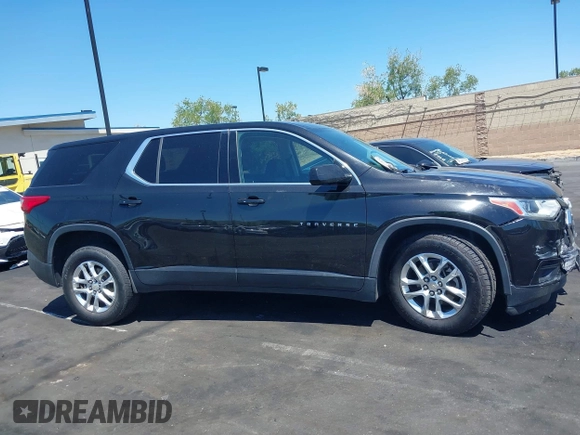 2019 Chevrolet Traverse LS z VIN 1GNERFKW3KJ222388, wystawiony jako IAAI lot #42225444 z przebiegiem 94 777 mil mil oraz . Historia ofert i sprzedaży dostępna na DreamBid. Obrazek 13.