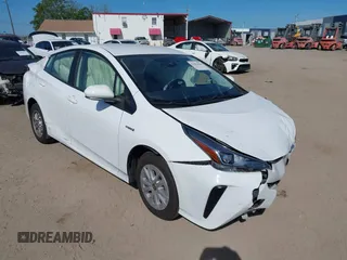 2021 Toyota Prius L Eco with VIN JTDKAMFU2M3147562, listed as a IAAI auction lot 41882066 with 99,491 mi miles. Bid and sale history available at carsss.com. Image 1.