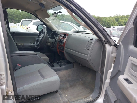 2005 Dodge Dakota SLT with VIN 1D7HW48N65S199887, listed as a IAAI auction lot 42508977 with 192,330 mi miles and . Bid and sale history available at DreamBid. Image 5.