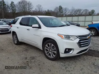 2021 Chevrolet Traverse Premier with VIN 1GNERKKW0MJ132238, listed as a IAAI auction lot 41515385 with 135,739 mi miles. Bid and sale history available at carsss.com. Image 1.