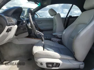 2008 BMW 1 Series 128i with VIN WBAUL73578VE88077, listed as a Copart auction lot 48655115 with 142,931 mi miles and Salvage title. Bid and sale history available at DreamBid. Image 7.