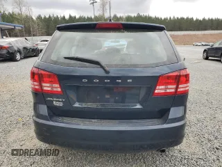2013 Dodge Journey American Value with VIN 3C4PDCAB6DT577273, listed as a Copart auction lot 50627295 with 139,775 mi miles and Salvage title. Bid and sale history available at DreamBid. Image 6.