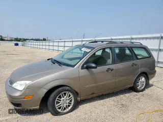2005 Ford Focus SE with VIN 1FAFP36N45W197064, listed as a Copart auction lot 60269095 with 194,669 mi miles and Salvage title. Bid and sale history available at DreamBid. Image 1.