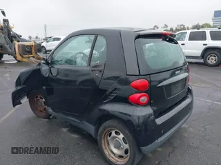 2012 Smart fortwo Pure z VIN WMEEJ3BA9CK521416, wystawiony jako IAAI lot #41847989 z przebiegiem Nie podano mil oraz . Historia ofert i sprzedaży dostępna na DreamBid. Obrazek 3.