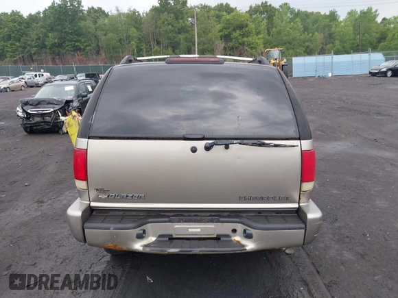2000 Chevrolet Blazer LT with VIN 1GNDT13W9YK287456, listed as a IAAI auction lot 42450504 with 139,649 mi miles and . Bid and sale history available at DreamBid. Image 16.