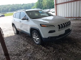 2014 Jeep Cherokee Limited z VIN 1C4PJMDS1EW130064, wystawiony jako IAAI lot #42431273 z przebiegiem 93 136 mil mil oraz . Historia ofert i sprzedaży dostępna na DreamBid. Obrazek 1.