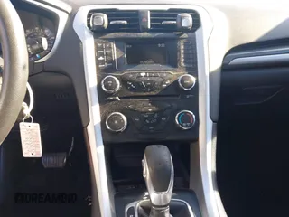2014 Ford Fusion S with VIN 1FA6P0G79E5383039, listed as a IAAI auction lot 42037262 with 192,400 mi miles and . Bid and sale history available at DreamBid. Image 18.