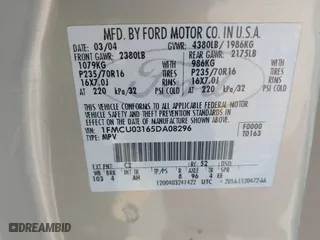 2005 Ford Escape XLT with VIN 1FMCU03165DA08296, listed as a IAAI auction lot 41677892 with 255,431 mi miles. Bid and sale history available at carsss.com. Image 9.