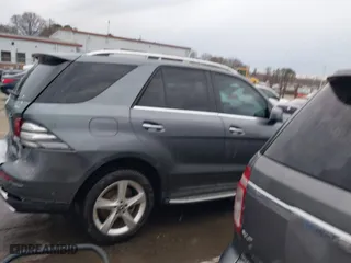 2017 Mercedes-Benz GLE with VIN 4JGDA5HB9HA992609, listed as a IAAI auction lot 41724638 with 205,921 mi miles. Bid and sale history available at carsss.com. Image 13.