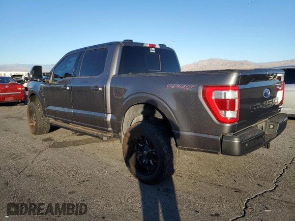 2022 Ford F-150 XL with VIN 1FTFW1E89NFA14920, listed as a Copart auction lot 76790934 with 64,991 mi miles and Salvage Title. Bid and sale history available at DreamBid. Image 2.