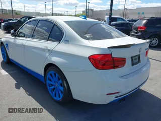 2017 BMW 3 Series 330e iPerformance with VIN WBA8E1C51HK895223, listed as a IAAI auction lot 41492625 with 116,486 mi miles. Bid and sale history available at carsss.com. Image 3.
