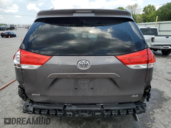 2014 Toyota Sienna XLE with VIN 5TDYK3DC6ES456558, listed as a Copart auction lot 63106085 with 231,260 mi miles and Salvage title. Bid and sale history available at DreamBid. Image 6.