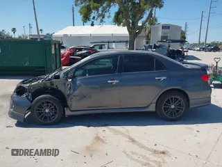 2011 Toyota Corolla L with VIN 2T1BU4EE8BC667772, listed as a IAAI auction lot 41960526 with 219,911 mi miles. Bid and sale history available at carsss.com. Image 15.