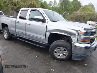 2018 Chevrolet Silverado 1500 LT with VIN 1GCVKREC7JZ151678, listed as a IAAI auction lot 41972011 with 106,892 mi miles and . Bid and sale history available at DreamBid. Image 6.