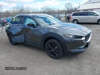 2025 Mazda CX-30 S Select Sport z VIN 3MVDMBBM3SM780382, wystawiony jako IAAI lot #41975147 z przebiegiem 1 501 mil mil oraz . Historia ofert i sprzedaży dostępna na DreamBid. Obrazek 1.