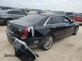 2018 Cadillac CT6 Luxury RWD z VIN 1G6KC5RX8JU103595, wystawiony jako Copart lot #47438045 z przebiegiem 135 004 mil mil oraz Czysty tytuł • Clean title. Historia ofert i sprzedaży dostępna na DreamBid. Obrazek 3.