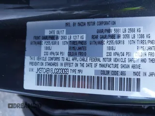 2018 Mazda CX-9 Sport z VIN JM3TCABY8J0203093, wystawiony jako IAAI lot #41218241 z przebiegiem 130 832 mil mil oraz . Historia ofert i sprzedaży dostępna na DreamBid. Obrazek 9.