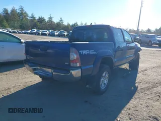 2014 Toyota Tacoma with VIN 3TMLU4EN5EM140028, listed as a IAAI auction lot 40965372 with 94,372 mi miles and . Bid and sale history available at DreamBid. Image 4.