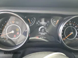 2021 Jeep Wrangler Unlimited Willys with VIN 1C4HJXDG3MW752441, listed as a Copart auction lot 55881925 with 61,751 mi miles and Salvage title. Bid and sale history available at DreamBid. Image 9.