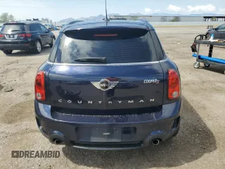 2016 MINI Countryman S with VIN WMWZC3C59GWT08439, listed as a Copart auction lot 65167955 with 76,336 mi miles and Salvage title. Bid and sale history available at DreamBid. Image 6.