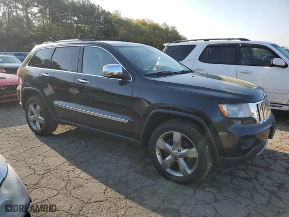 2012 Jeep Grand Cherokee Overland with VIN 1C4RJFCG4CC292383, listed as a Copart auction lot 51168385 with 132,697 mi miles and Salvage Title. Bid and sale history available at carsss.com. Image 4.