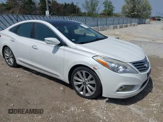 2014 Hyundai Azera Limited z VIN KMHFH4JG2EA373608, wystawiony jako IAAI lot #42125063 z przebiegiem 121 111 mil mil oraz . Historia ofert i sprzedaży dostępna na DreamBid. Obrazek 1.