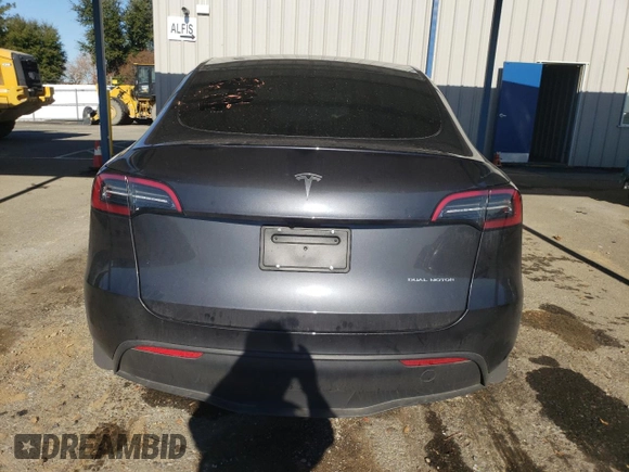 2024 Tesla Model Y Long Range with VIN 7SAYGDEE4RF127409, listed as a Copart auction lot 84274794 with 14,246 mi miles and Salvage title. Bid and sale history available at DreamBid. Image 6.