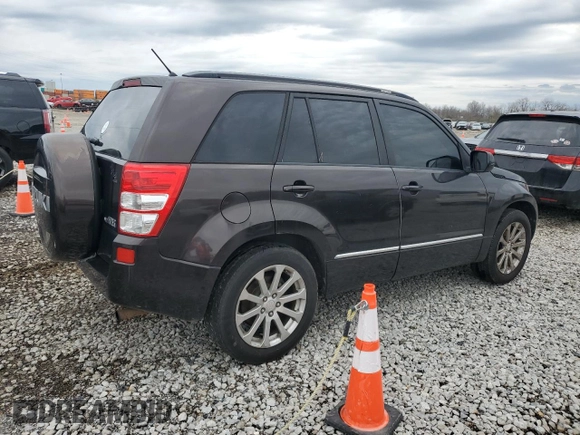 2013 Suzuki Grand Vitara z VIN JS3TE0D44D4100033, wystawiony jako Copart lot #51648665 z przebiegiem 151 879 mil mil oraz Czysty tytuł • Clean title. Historia ofert i sprzedaży dostępna na DreamBid. Obrazek 3.