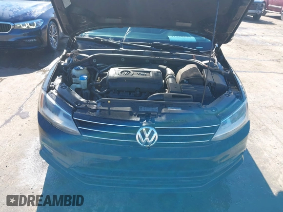 2015 Volkswagen Jetta Sedan 1.8T SE w/Connectivity with VIN 3VWD07AJ6FM303403, listed as a IAAI auction lot 41330778 with 150,949 mi miles. Bid and sale history available at carsss.com. Image 10.