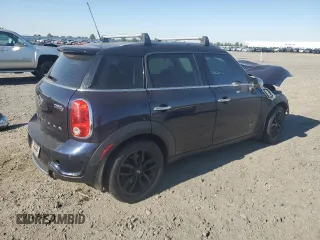 2013 MINI Countryman S ALL4 with VIN WMWZC5C52DWM16196, listed as a Copart auction lot 65157165 with Not provided miles and Salvage title. Bid and sale history available at DreamBid. Image 3.