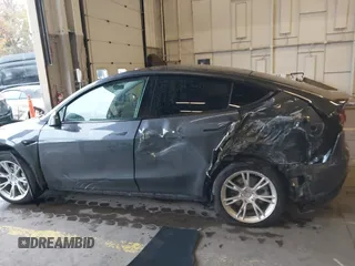 2020 Tesla Model Y Long Range z VIN 5YJYGDEE8LF008945, wystawiony jako IAAI lot #41185905 z przebiegiem 31 916 mil mil oraz . Historia ofert i sprzedaży dostępna na DreamBid. Obrazek 14.