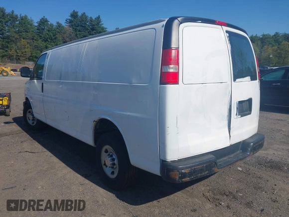 2014 Chevrolet Express Cargo with VIN 1GCWGGCA5E1125676, listed as a IAAI auction lot 42234161 with 285,045 mi miles and . Bid and sale history available at DreamBid. Image 3.