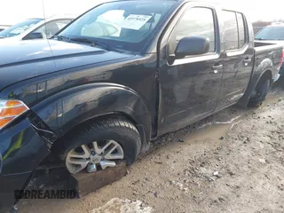 2019 Nissan Frontier SV z VIN 1N6AD0EV9KN723149, wystawiony jako IAAI lot #41978525 z przebiegiem 86 415 mil mil oraz . Historia ofert i sprzedaży dostępna na DreamBid. Obrazek 6.