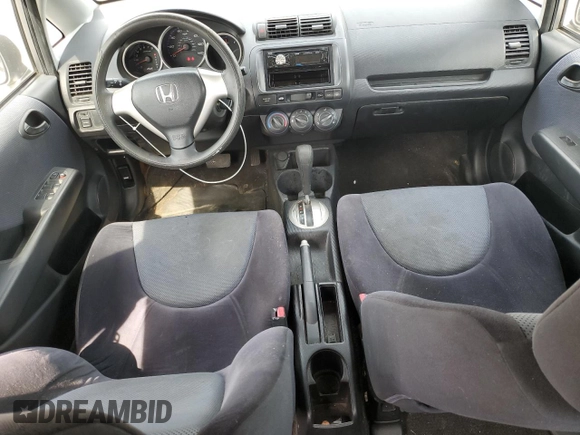 2007 Honda Fit z VIN JHMGD38427S021652, wystawiony jako Copart lot #52692775 z przebiegiem 178 416 mil mil oraz Szkoda całkowita • Salvage title. Historia ofert i sprzedaży dostępna na DreamBid. Obrazek 8.
