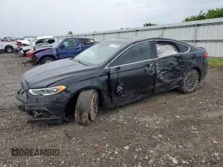 2018 Ford Fusion Titanium с VIN 3FA6P0K91JR183997, выставлен на аукционе Copart как лот 57717235 с пробегом 133 385 миль миль и Списание • Salvage title. История ставок и продаж доступна на DreamBid. Изображение 1.