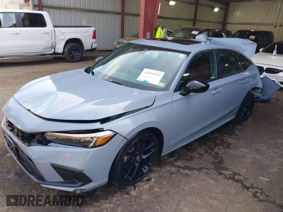 2022 Honda Civic Si with VIN 2HGFE1E52NH474042, listed as a IAAI auction lot 42099415 with 26,828 mi miles and . Bid and sale history available at DreamBid. Image 2.