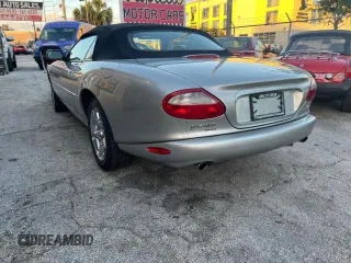 1999 Jaguar XK z VIN SAJGX204XXC041660, wystawiony jako Copart lot #88755785 z przebiegiem 70 091 mil mil oraz Tytuł czysty. Historia ofert i sprzedaży dostępna na DreamBid. Obrazek 3.