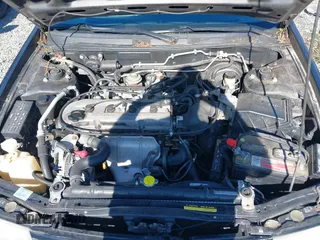 1996 Nissan Altima XE with VIN 1N4BU31D1TC119359, listed as a IAAI auction lot 41664170 with 140,672 mi miles and . Bid and sale history available at DreamBid. Image 10.