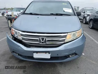 2012 Honda Odyssey EX-L with VIN 5FNRL5H66CB061847, listed as a IAAI auction lot 42162377 with 217,204 mi miles and . Bid and sale history available at DreamBid. Image 6.