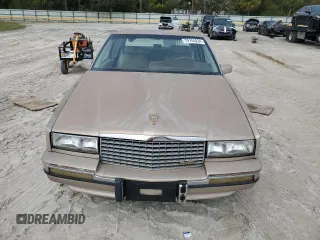 1991 Cadillac Eldorado z VIN 1G6EL13B4MU604636, wystawiony jako Copart lot #79155234 z przebiegiem Nie podano mil oraz Nie do naprawy. Historia ofert i sprzedaży dostępna na DreamBid. Obrazek 5.