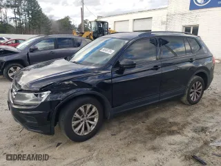 2018 Volkswagen Tiguan S with VIN 3VV1B7AXXJM105874, listed as a Copart auction lot 86565734 with 100,901 mi miles and Salvage Title. Bid and sale history available at carsss.com. Image 1.