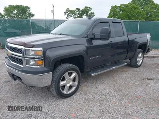 2015 Chevrolet Silverado 1500 LS with VIN 1GCVKPEC8FZ268567, listed as a IAAI auction lot 42237774 with 156,241 mi miles and . Bid and sale history available at DreamBid. Image 2.