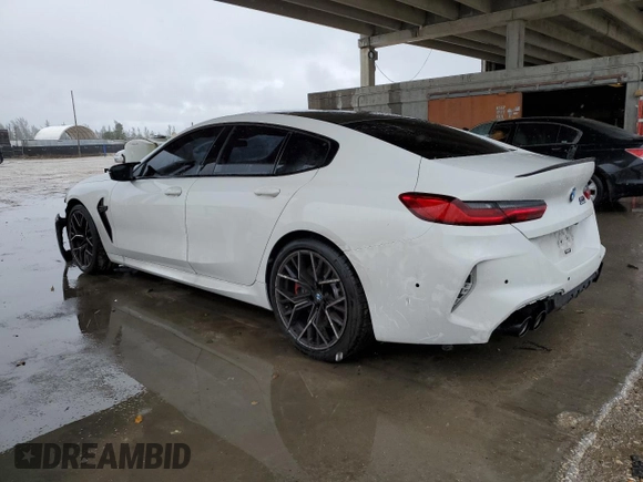 2022 BMW M8 Competition z VIN WBSGV0C01NCJ53223, wystawiony jako Copart lot #76250753 z przebiegiem 25 966 mil mil oraz . Historia ofert i sprzedaży dostępna na DreamBid. Obrazek 2.