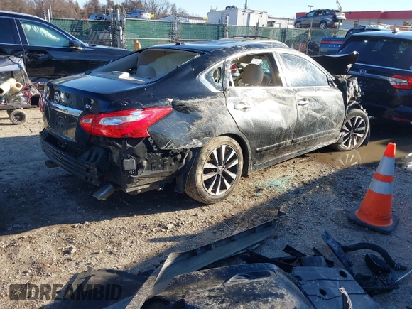 2016 Nissan Altima SV with VIN 1N4AL3AP0GC131985, listed as a IAAI auction lot 41191649 with 96,000 mi miles and . Bid and sale history available at DreamBid. Image 4.