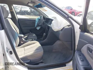 1999 Toyota Camry LE z VIN 4T1BG22K0XU862535, wystawiony jako IAAI lot #42116856 z przebiegiem 186 094 mil mil oraz . Historia ofert i sprzedaży dostępna na DreamBid. Obrazek 5.