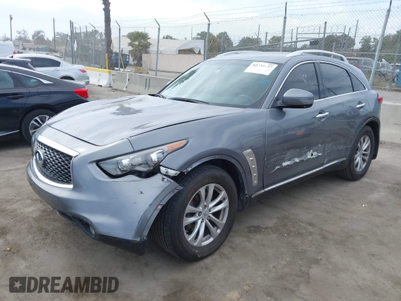 2014 Infiniti QX70 with VIN JN8CS1MU8EM450428, listed as a IAAI auction lot 42233727 with 88,342 mi miles and . Bid and sale history available at DreamBid. Image 2.