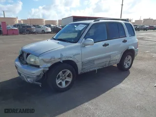 2003 Suzuki Grand Vitara with VIN JS3TE62VX34101622, listed as a IAAI auction lot 41689760 with 152,104 mi miles. Bid and sale history available at carsss.com. Image 2.